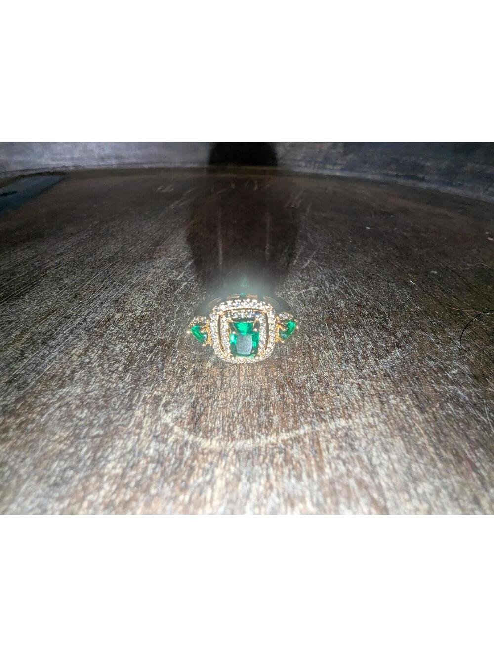 Gold Tone Ring with Green Gemstones and Clear Accents
